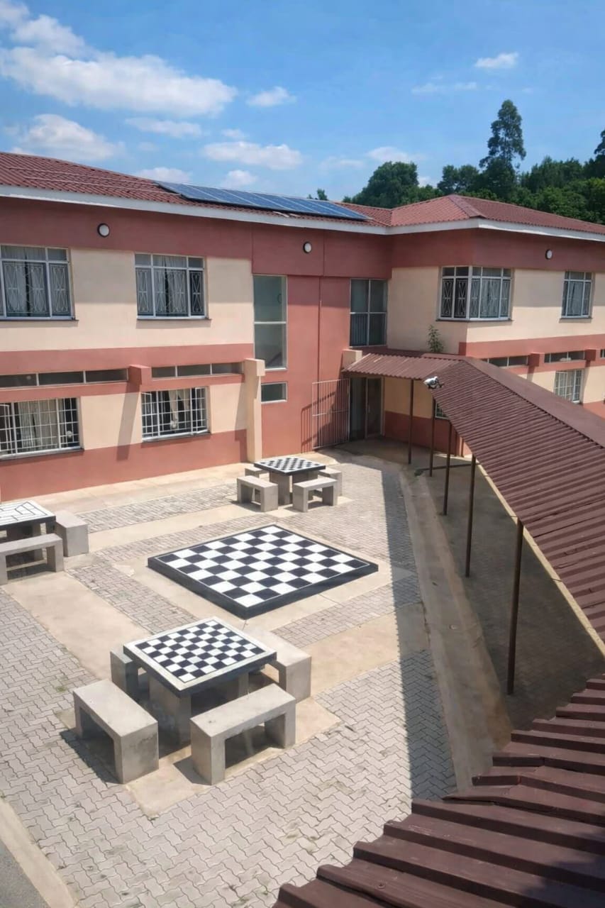 Residence courtyard with outdoor seating and games area